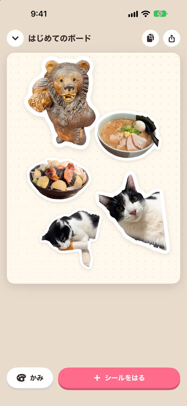 クマ・ラーメン・ジンギスカン・ねこのシールを貼ったボード